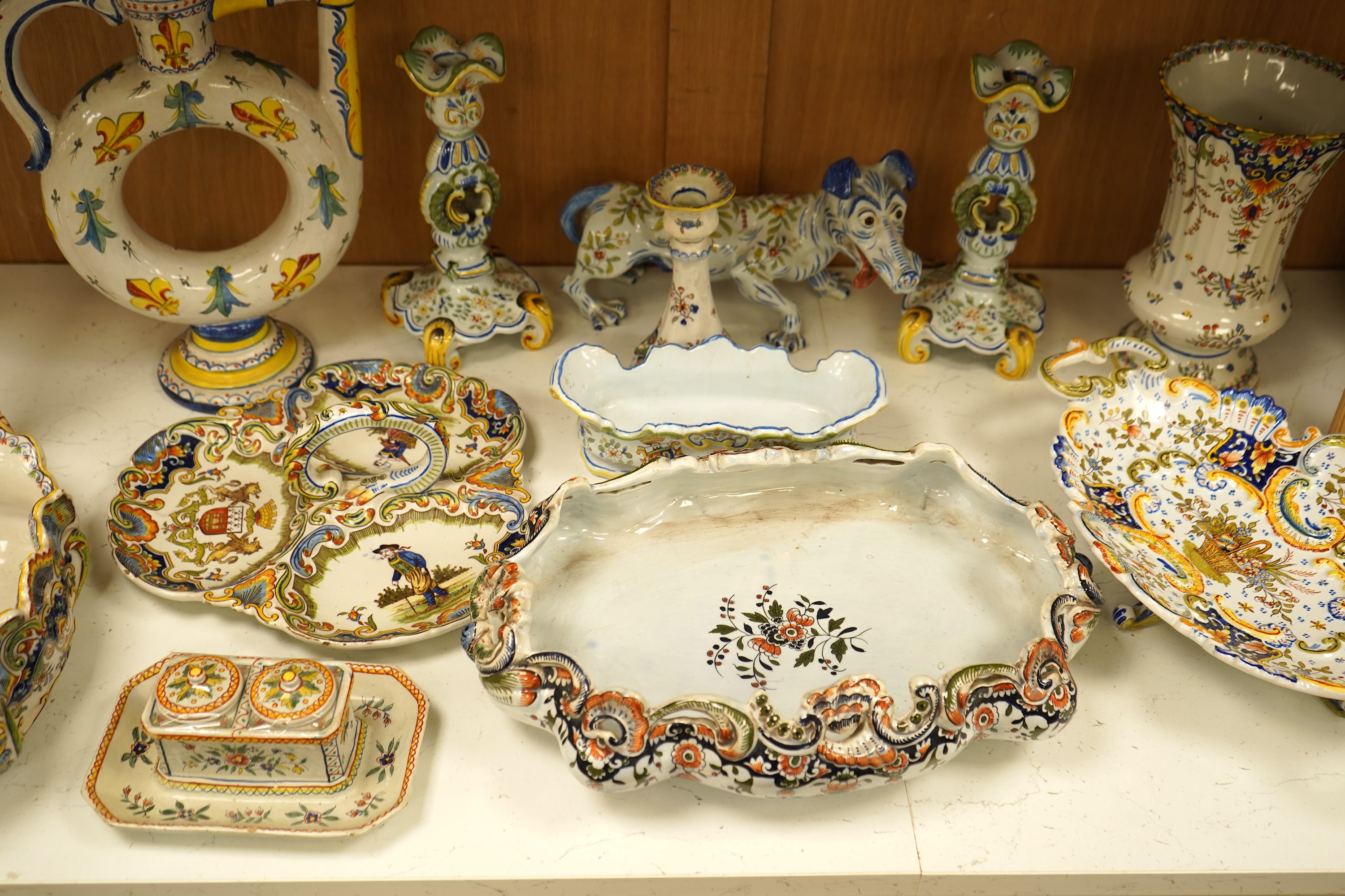 A collection of early 20th century French faience pieces To include dishes, an inkwell and a large ewer, 42cm high